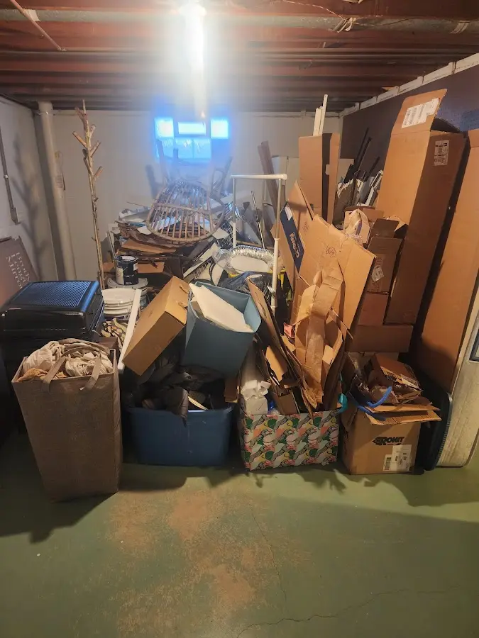 Roll-off dumpster container at job site for 2 Yard Dumpster Rental in Country Club